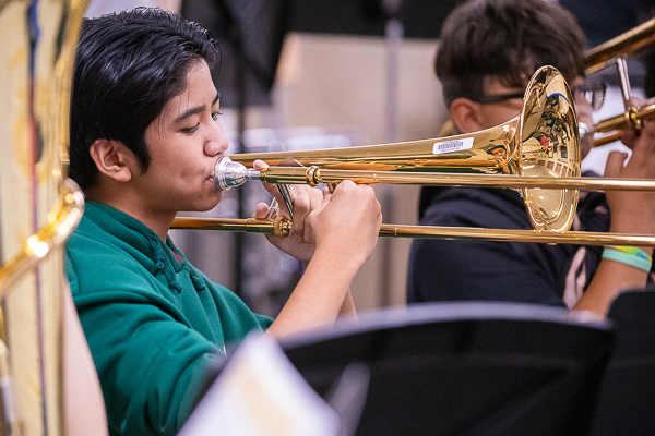 Students playing trumpets.